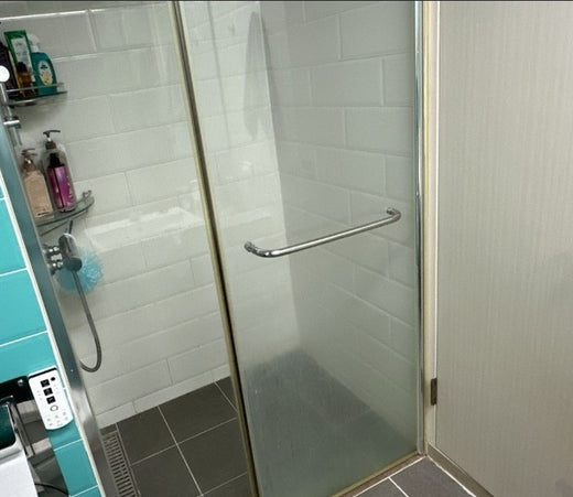 shower door with water stain